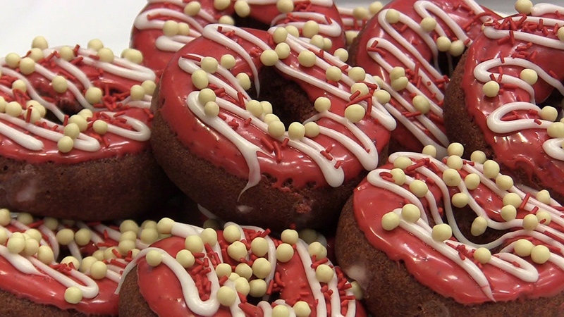 "The Big Canadian Red" donut is shown as part of the Tim Hortons Duelling Donuts competition in Toronto on Wednesday Aug. 13, 2014. (THE CANADIAN PRESS/Sadiya Ansari)
