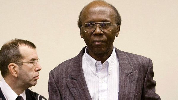Leon Mugesera, accused of helping incite the Rwandan genocide, arrives for his immigration hearing to seek a judicial review and a delay of his expulsion from Canada, Monday, January 16, 2012 in Montreal. Mugesera lost a two-decade battle to stay in Canada and is now set to be deported.