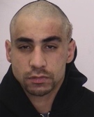 Police issued an arrest warrant for Chad Noureddine, 28, in connection with a slaying in the city's portlands area.