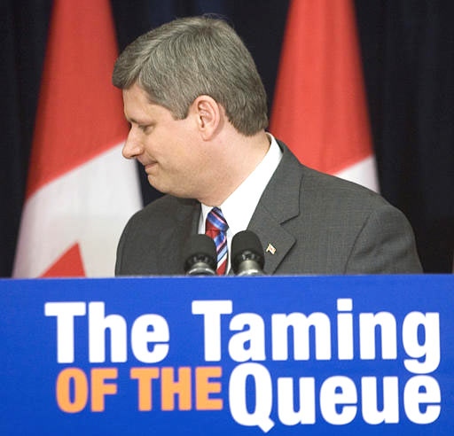 Prime Minister Stephen Harper delivers a speech to participants at a conference on hospital wait times, in Ottawa on April 4, 2007. (CP / Tom Hanson)