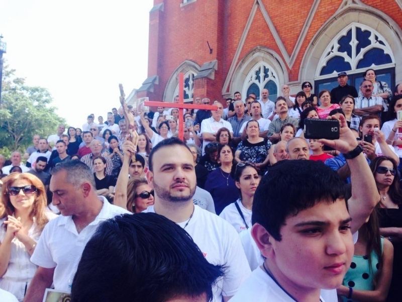 Members of the Chaldean Catholic Church in Windsor, Ont. hold a peaceful rally on Sunday, Aug. 17, 2014 to draw attention to the plight of Christians in Iraq.
(Stefanie Masotti/CTV Windsor)