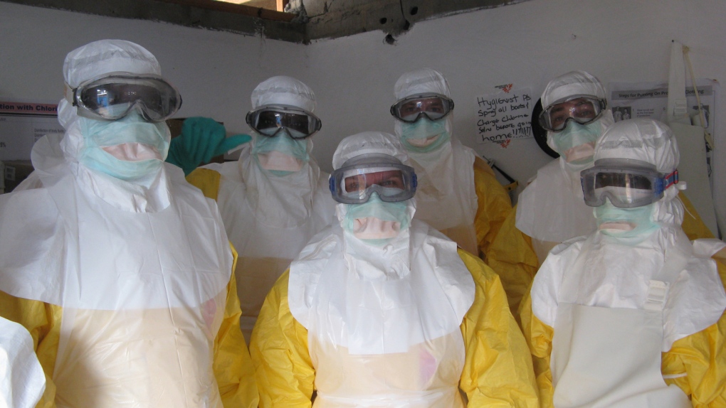 Ebola health workers battle death, heat