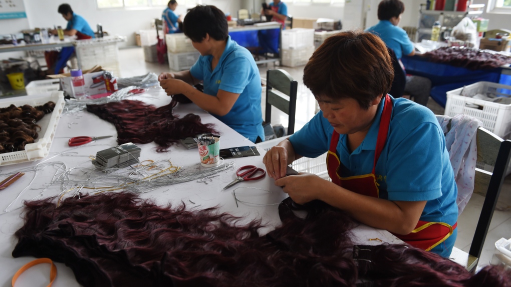 Human hair exports big business in rural Chinese county | CTV News
