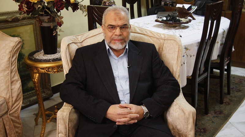 In this Friday, Jan. 20, 2012 photo, Muslim Brotherhood spokesman Mahmoud Ghozlan listens during an interview at his home in Cairo, Egypt. (AP Photo/Nariman El-Mofty)