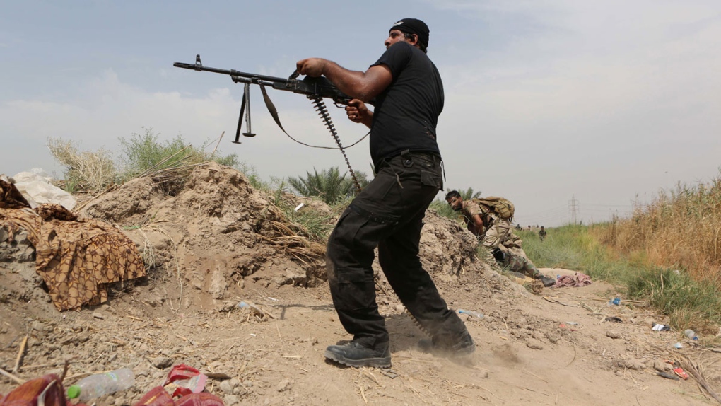 Iraqi troops clash with militants