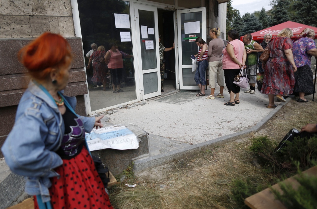People wait in Donetsk, Ukraine
