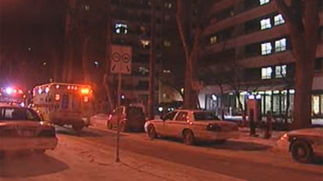 Police and emergency crews were on scene in the 300 block of Assiniboine Avenue in Winnipeg on Jan. 23, 2012. A 34-year-old woman was rushed to hospital in critical condition, but died from injuries. 