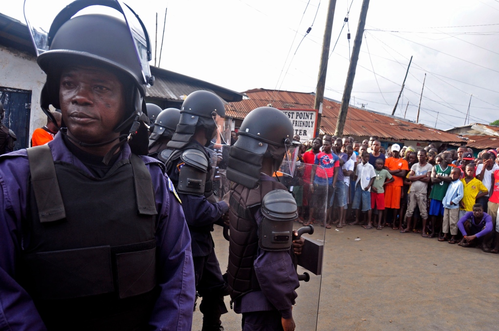 Liberian forces control crowds over Ebola fears