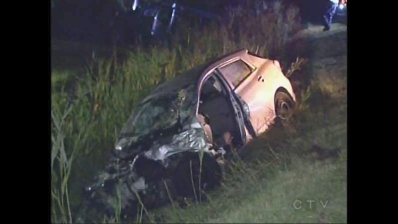 A vehicle sits in a ditch in Central Elgin, Ont. on Thursday, Aug. 22, following a two vehicle crash. (CTV London)