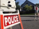A Windsor police barricade blocks the 1200 block of Moy Avenue in Windsor, Ont. on Friday, Aug. 22, 2014. (Michelle Maluske/ CTV Windsor)