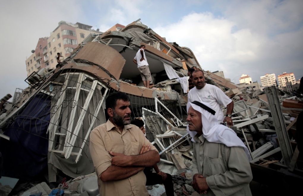 Israeli strikes topple large buildings in Gaza