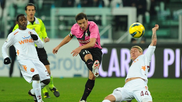 Juventus captain Alessandro Del Piero, center, scores a goal during the Italian Cup eight final soccer match between Juventus and AS Roma, in Turin, Italy, Tuesday, Jan. 24, 2012. (AP Photo/Massimo Pinca)
