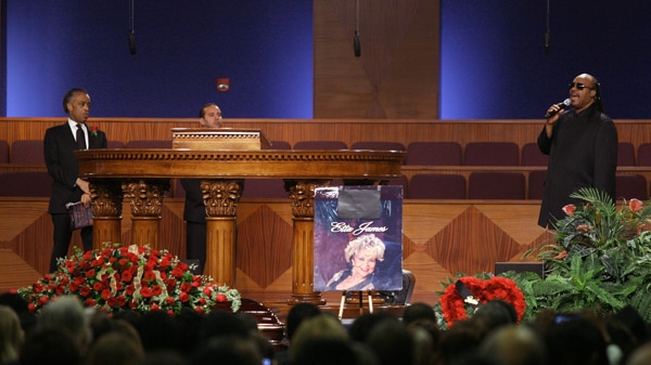 Al Sharpton looks on as Stevie Wonder performs at a memorial service for singer Etta James at Greater Bethany Community Church City of Refuge in Gardena, Calif., Saturday, Jan. 28, 2012. (AP / Ringo H.W. Chiu)
