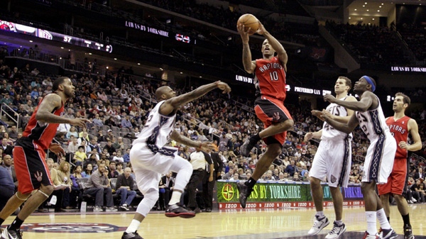 Toronto Raptors' DeMar DeRozan goes up for a shot against the New Jersey Nets during the second half of an NBA basketball game which the Raptors won 94-73 on Sunday, Jan. 29, 2012, in Newark, N.J. (AP Photo/Julio Cortez)