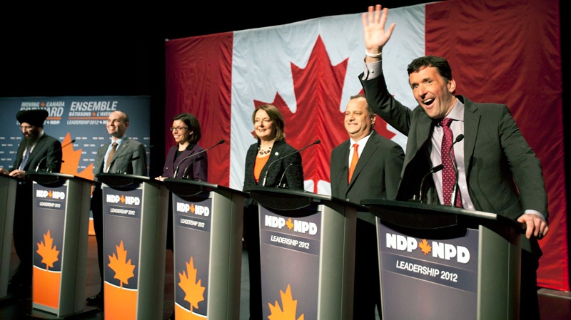 NDP federal leadership candidate Paul Dewar waves to the audience during the introduction of candidates at a leadership debate in Halifax, Sunday, Jan. 29, 2012. (Tim Krochak / THE CANADIAN PRESS)