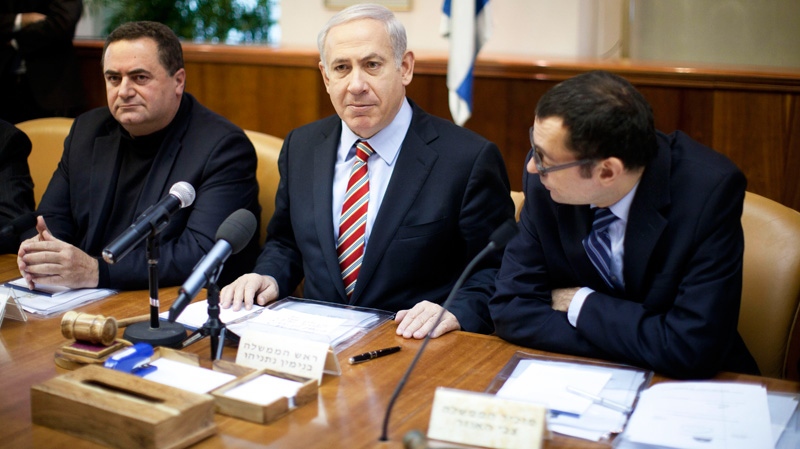 Israeli Prime Minister Benjamin Netanyahu, center, convenes the weekly cabinet meeting in Jerusalem, Sunday, Jan. 29, 2012. 