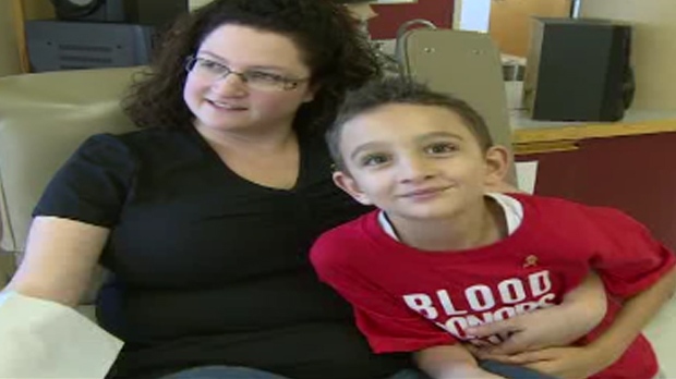 Kate Aversa and her eight-year-old son, Luke Avers