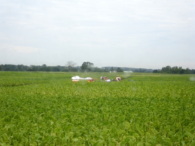 Roy Easton captured photographs of an experimental hybrid aircraft crashing in his tobacco field near the Brantford Airport on Friday, Aug. 29, 2014.