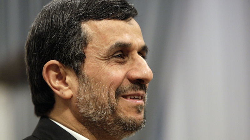 Iranian President Mahmoud Ahmadinejad, smiles, prior to a meeting at the presidency office in Tehran, Iran, Tuesday, Jan. 31, 2012. (AP Photo/Vahid Salemi)
