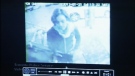 Toronto police show a video of a woman they are searching for whom they suspect to be connected to the offenders in the Anthony Spencer murder on Tuesday, Jan. 31, 2012.