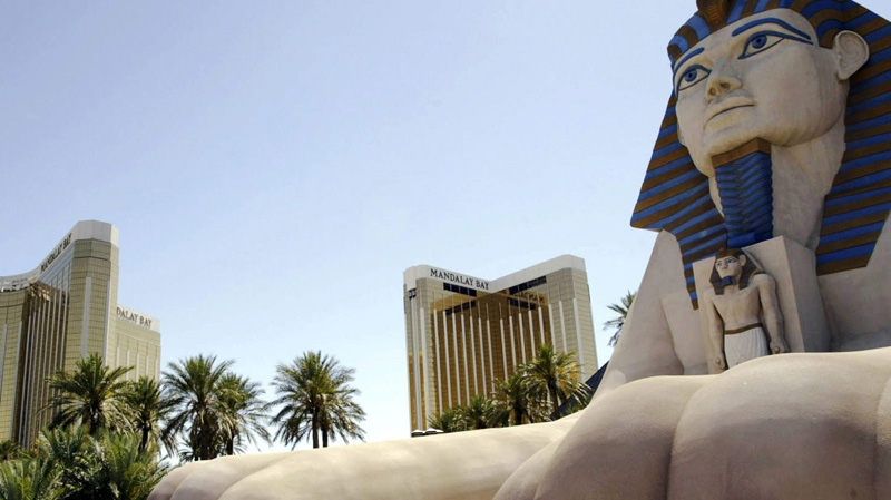 In this June 5, 2004 file photo, the Mandalay Bay towers, left and center rear, and the Luxor hotel, are seen in Las Vegas. (AP Photo/Las Vegas Sun, R. Marsh Starks, File)