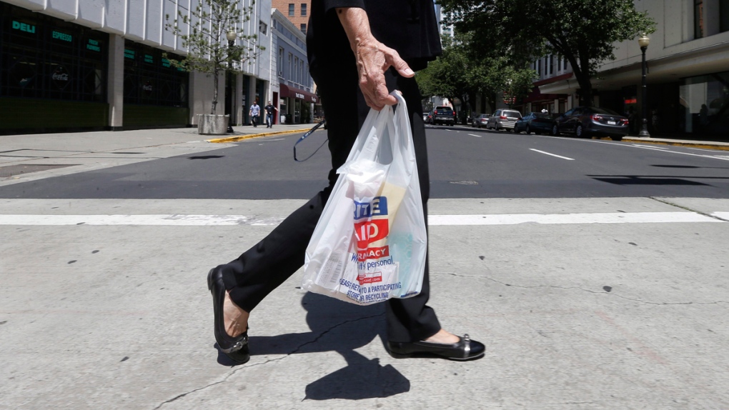 Walking with a plastic bag in Sacramento
