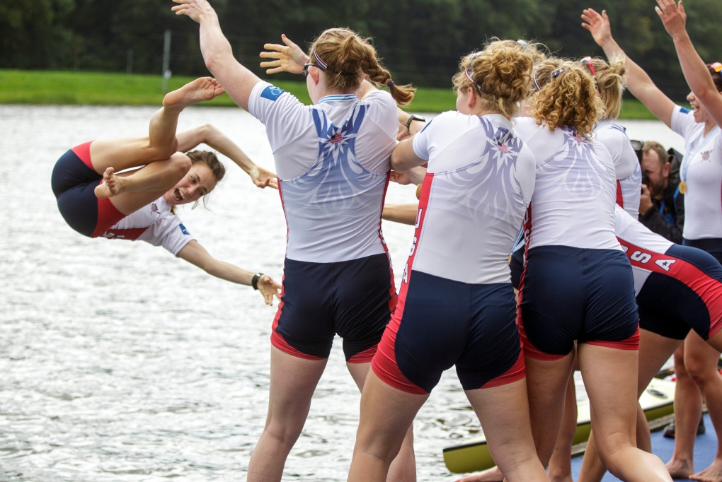 Katelin Snyder thrown in water at Rowing finals 