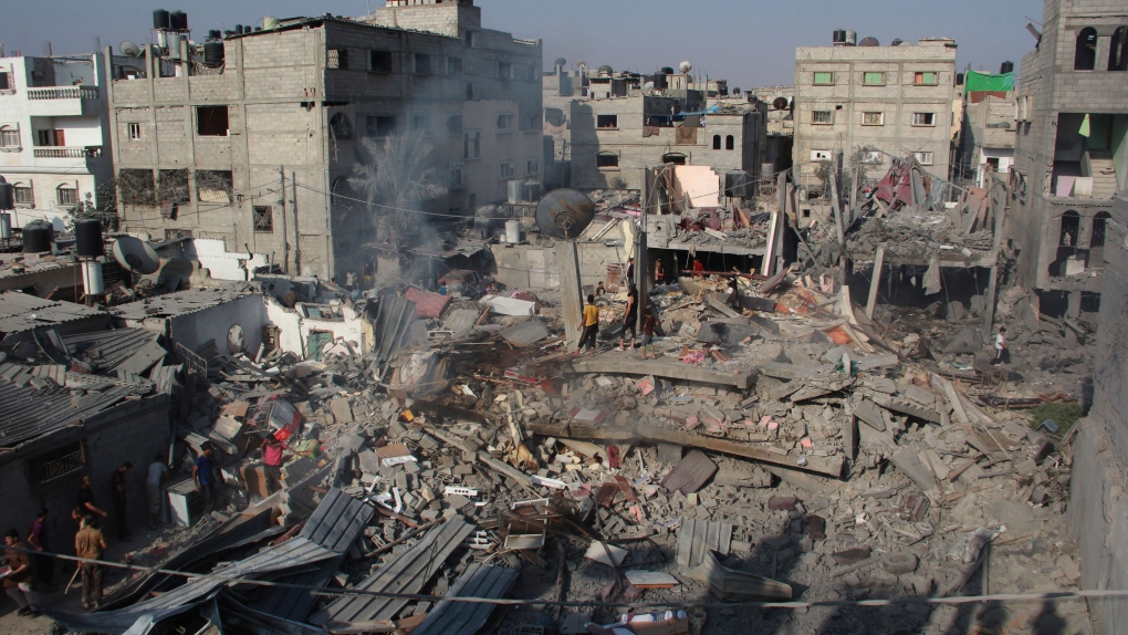 Houses destroyed in an Israeli strike in Gaza