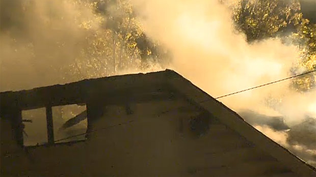 Fire destroys garage, garage fire, raddison height