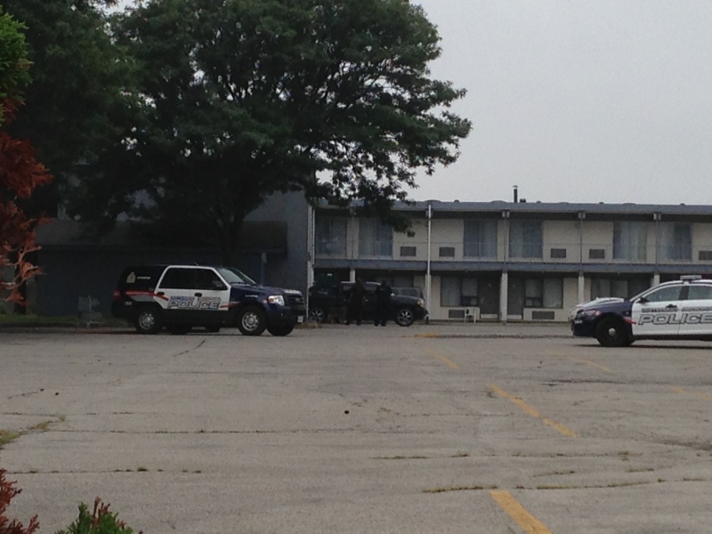 Police vehicles sit outside a hotel on Weber Street East in Kitchener on Tuesday, Sept. 2, 2014. (Brian Dunseith / CTV Kitchener)