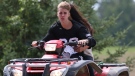 Justin Bieber and Selena Gomez ride an ATV in the Township of Perth East near his hometown of Stratford, Ont. (etalk)