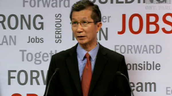 Michael Chan, the minister of tourism, culture, and sport speaks to the press in Toronto on Wednesday, Feb. 1, 2012.
