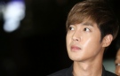 In this Sept. 2, 2014 photo, South Korean singer and actor Kim Hyun-joong arrives at the Gangnam police station in Seoul, South Korea. (AP Photo/Yang Ji-woong, Yonhap) KOREA OUT