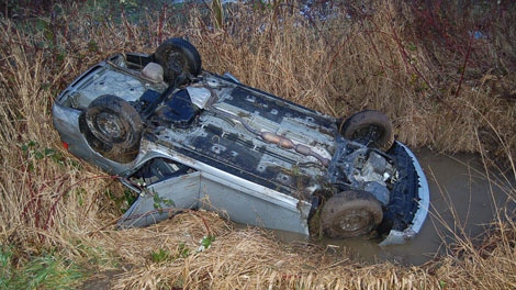 A toddler from Surrey, B.C. was rescued by an off-duty cop after her mother crashed their car into a ditch Wednesday morning. Feb. 1, 2012. (Handout)
