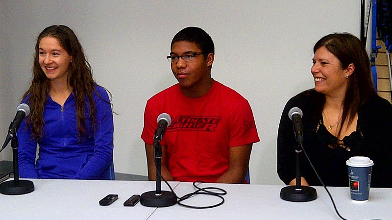 Zach Judd, 16, is joined by his physiotherapist Annette Lemke (L) and his mother Desiree Judd (R) as he speaks publicly for the first time since a crash took the lives of four of his friends near Grande Prairie in October 2011. Friday, February 3