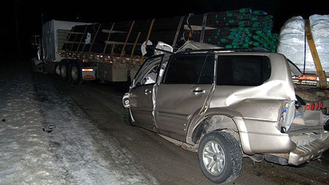 RCMP provided CTV News with this photo of the scene after a head-on collision between a trailer truck and an SUV killed a family of four. Feb. 1, 2012. (RCMP)