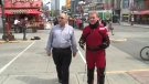 CTV's Eric Longley wears the arthritis suit in Ottawa's Byward Market Sep. 4, 2014