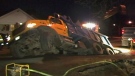 A city truck lies stuck in a sinkhole on Barbara Crescent in East York on Thursday, Feb. 2, 2012.