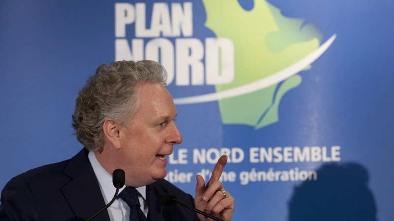 Quebec Premier Jean Charest speaks of tourism for the Plan Nord, a northern Quebec development plan, Wednesday, November 23, 2011 in Quebec City. THE CANADIAN PRESS/Jacques Boissinot