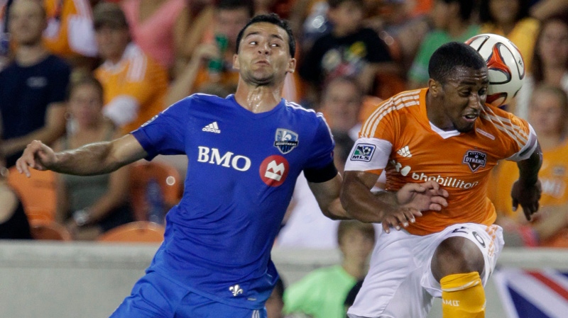 Montreal Impact Dilly Duka, left, and Houston Dyna