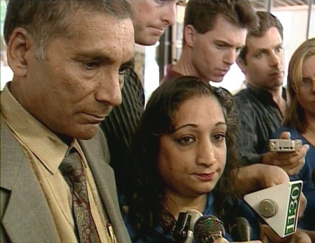 The parents of Reena Virk, Suman and Manjit Virk, are seen in this undated image taken from video.