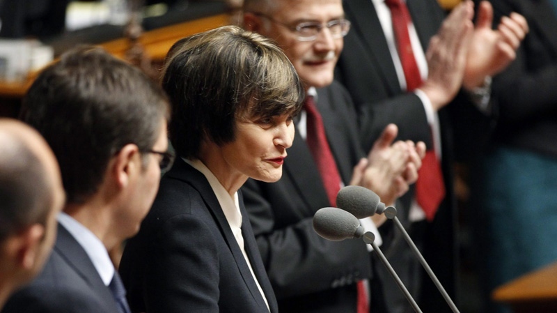 Swiss Federal President and Foreign Minister Micheline Calmy-Rey delivers her farewell speech during a parliament session in Bern, Switzerland, Dec. 14, 2011. (AP Photo/Ruben Sprich, Pool)