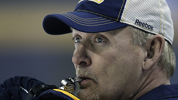 Buffalo Sabres coach Lindy Ruff blows the whistle to start a drill during NHL hockey practice in Buffalo, N.Y., Wednesday, Nov. 30, 2011. (AP Photo/David Duprey)