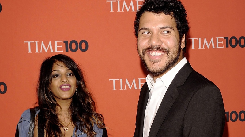 World music artist Maya Arulpragasam aka M.I.A., left, and boyfriend Benjamin Bronfman attend the Time 100 Gala, a celebration of TIME Magazine's 100 most influential people in the world, on Tuesday, May 5, 2009 in New York. (AP Photo/Evan Agostini)