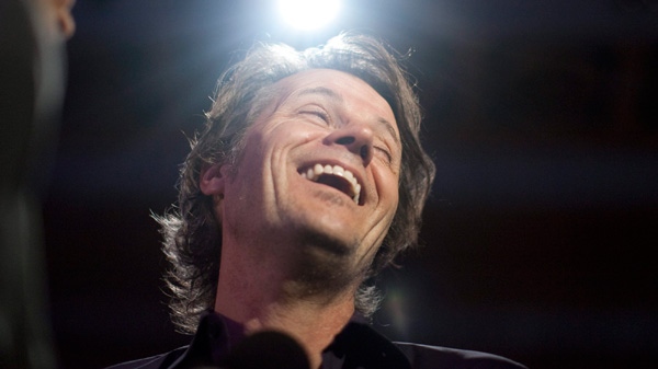 Jim Cuddy of Blue Rodeo reacts to a journalist's question as he's interviewed following the Juno Award nominations announcement in Toronto on Tuesday, Feb. 7 , 2012. (Chris Young / THE CANADIAN PRESS)