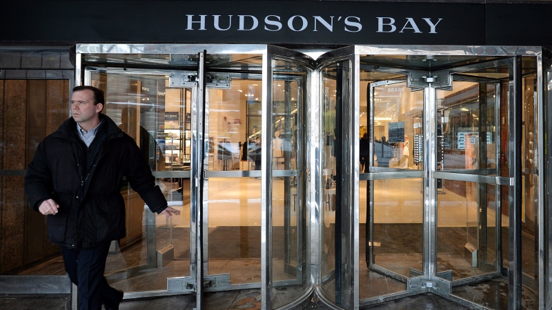 A man leaves the downtown Toronto flagship Hudson Bay Company store in Toronto, Jan. 27, 2014. (Nathan Denette / THE CANADIAN PRESS)