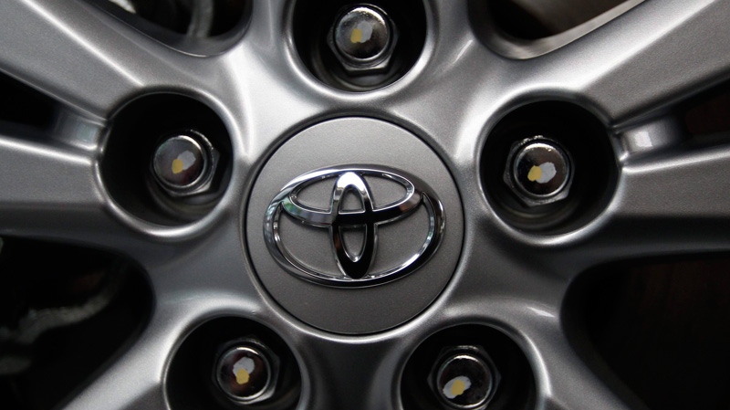 The Toyota Motor Corp. logo is seen on a tire wheel of an Avensis sedan at Toyota's headquarters in Tokyo, Japan, Aug. 2, 2011. (AP / Shizuo Kambayashi)