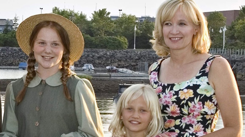 In this Aug. 1, 2007 photo, Laureen Harper (right) and daughter Rachal pose with Laura Dunn, an Anne of Green Gables impersonator, in Charlottetown P.E.I. (THE CANADIAN PRESS/Jacques Boissinot)