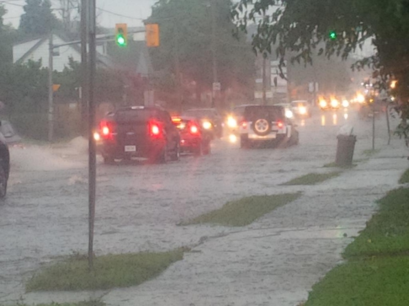 Flooded streets are seen on Wellington Road north of Base Line Road in London, Ont. on Wednesday, Sept. 10, 2014. (@DanStrums / Twitter)