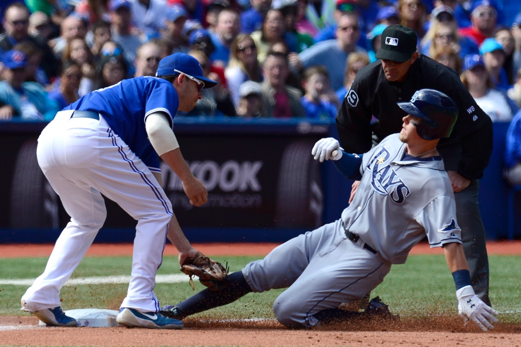 Rays blow lead but rally to beat Jays